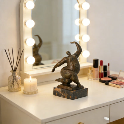 This abstract bronze figure sculpture expresses strength, motion, and emotional release through a bold, upward-reaching pose. The figure rises from a grounded stance, with the body twisting dynamically as one arm extends skyward—capturing a moment of transformation, aspiration, and inner power.