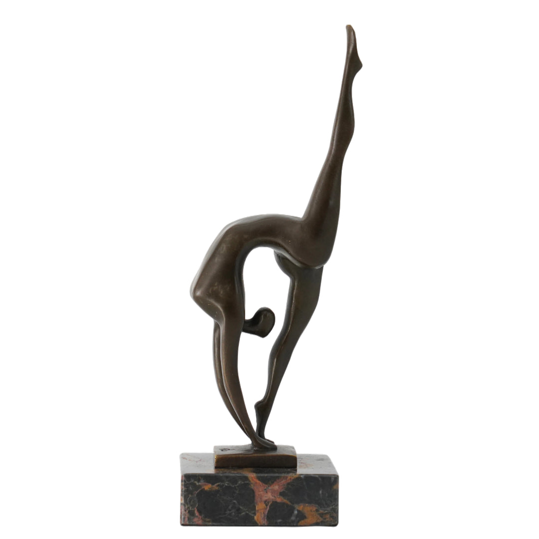 This abstract dancer brass sculpture features a highly stretched pose formed with minimalist lines, expressing strong movement and artistic tension. Crafted in brass with a vintage metal finish, it combines lightness and strength, making it an ideal accent for modern art-inspired interiors.