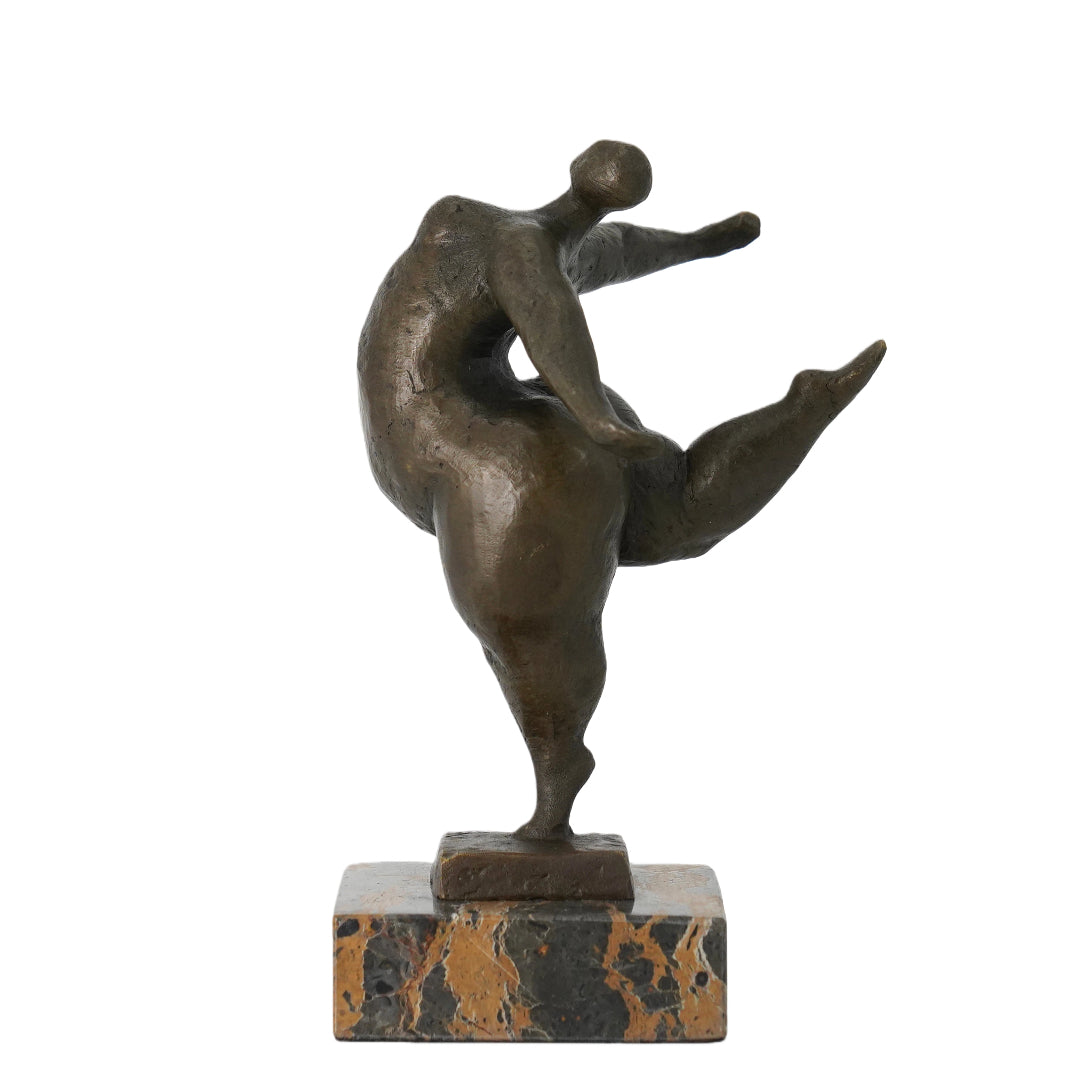 This abstract bronze sculpture captures a powerful moment of motion and balance through the human form. The figure appears suspended in a dynamic pose—one leg grounded, the body twisting upward, arms and limbs extending with expressive freedom.