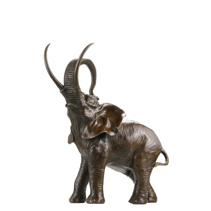 a majestic bronze elephant sculpture featuring realistic textures and raised trunk symbolism. A powerful wildlife statue symbolizing strength, wisdom, and prosperity.