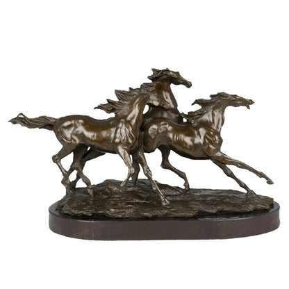 This is a dynamic bronze sculpture of three galloping horses, crafted using the lost-wax casting method. The piece captures the raw energy and synchronized motion of the horses as they surge forward in a powerful herd, their bodies lean and taut, muscles rippling under a smooth, polished bronze patina. Their manes and tails stream backward, as if caught in the wind, conveying a sense of unbridled speed, freedom, and collective vitality.