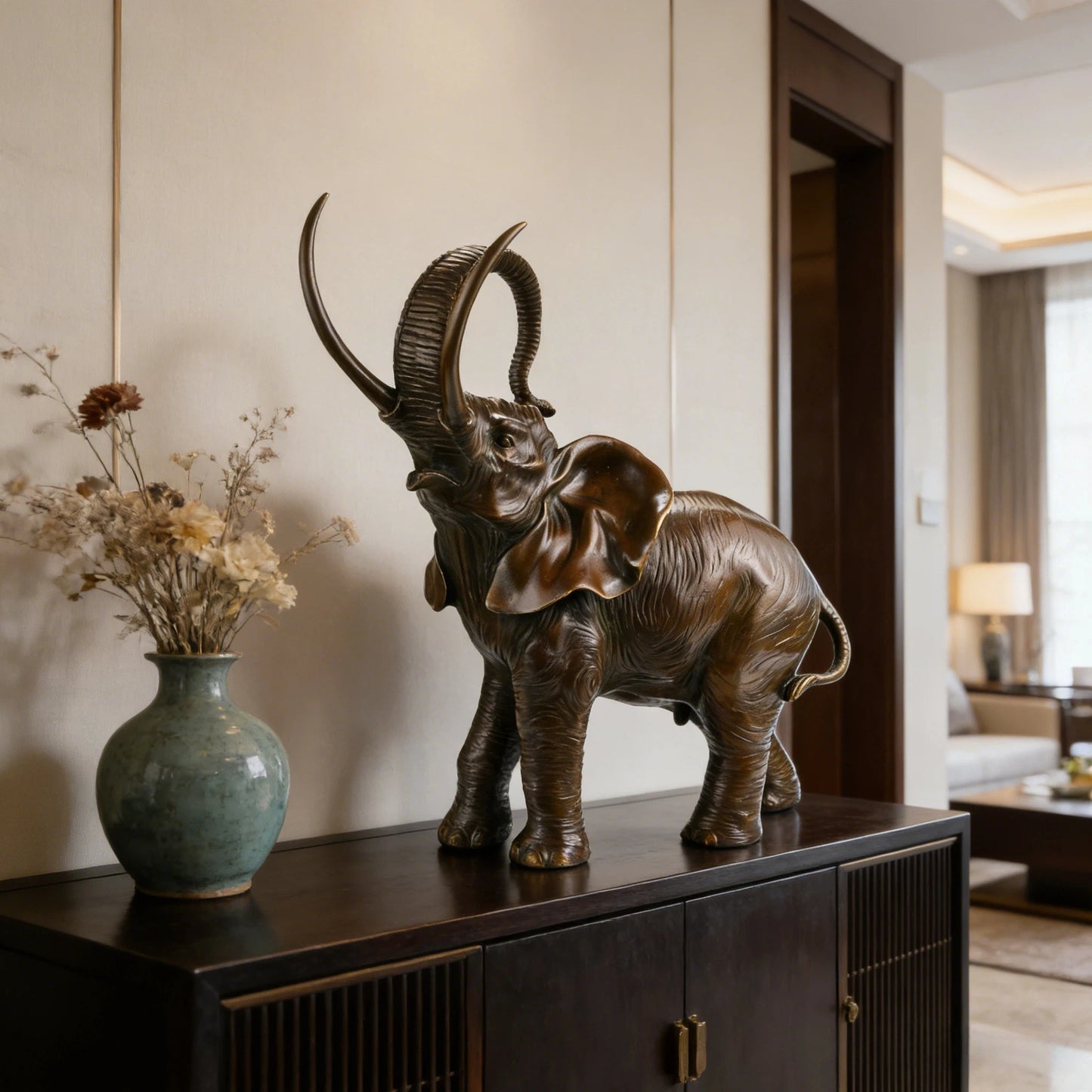This is a vibrant bronze sculpture of an African elephant, crafted using the lost-wax casting method. 