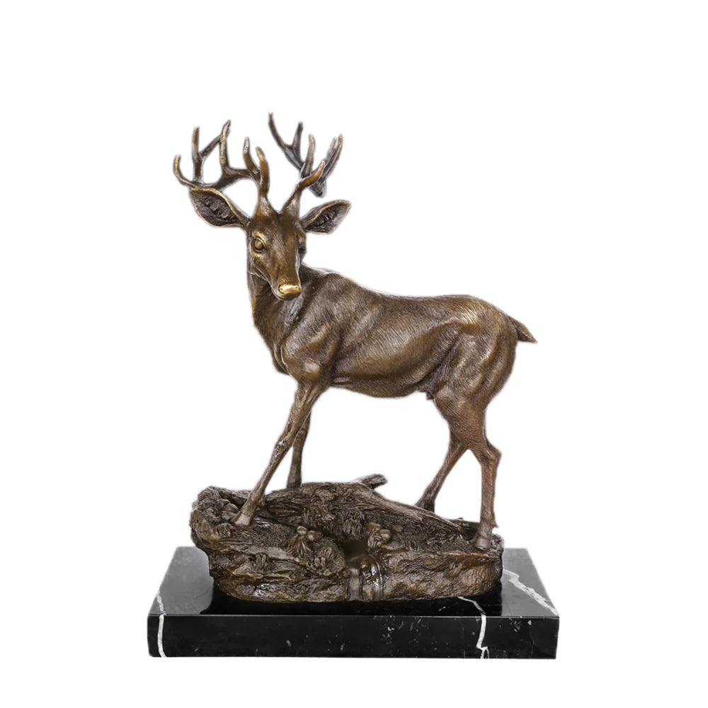 Handcrafted bronze stag sculpture featuring detailed antlers and naturalistic base. Lost-wax cast deer statue on marble base, ideal for luxury home decor.