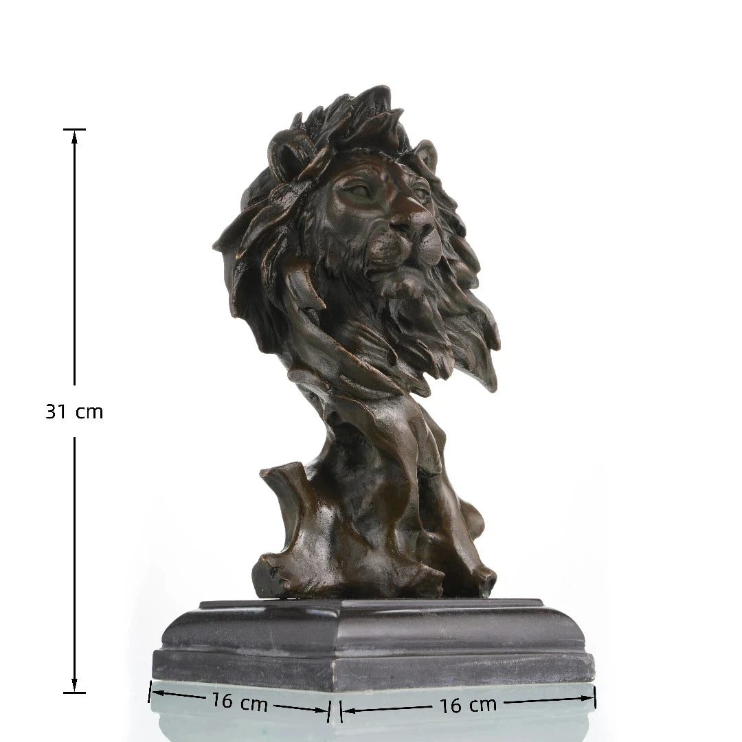 This is a striking bronze bust of a lion, crafted using the lost-wax casting method. The sculpture focuses on the lion’s head and upper neck, capturing the animal in a moment of quiet intensity, with its mane rendered in dynamic, flowing forms that suggest movement and raw power. The deep, rich bronze patina accentuates the intricate details of the lion’s facial features—from the intense gaze of its eyes to the texture of its whiskers—and the dramatic, almost wind-swept folds of its mane.