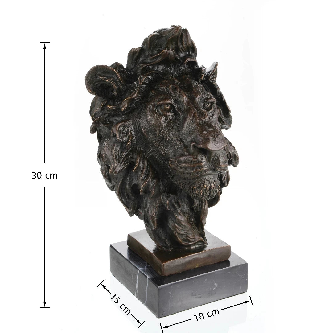 This is a powerful bronze bust of a lion, crafted using the lost-wax casting method. The sculpture focuses on the lion’s head and upper neck, capturing the animal in a moment of intense focus and regal authority. The deep, rich bronze patina accentuates the hyper-realistic details of the lion’s face—from the piercing gaze of its eyes and the rough texture of its whiskers to the intricate, flame-like folds of its mane, which appear to be caught in a powerful gust of wind.