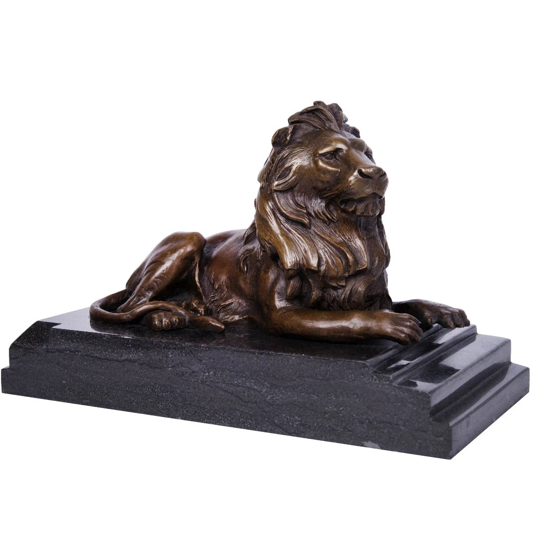 This majestic bronze lion sculpture, crafted using the lost-wax casting method, captures the animal in a poised, reclining stance. The rich bronze patina highlights the lion’s powerful musculature and flowing mane, while its elevated head and relaxed posture convey quiet authority and regal composure. Mounted on a stepped dark marble plinth, the sculpture exudes stability, grandeur, and timeless elegance, making it ideal for refined interiors or as a distinguished art collection piece.