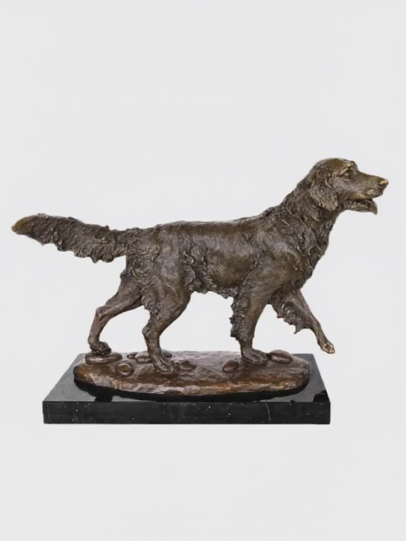 This dynamic bronze golden retriever sculpture is crafted using the traditional lost-wax casting method, capturing the dog mid-stride with lively movement and alert expression. The warm bronze patina highlights the flowing texture of its long coat and the natural musculature of its form. Set on a sleek dark marble base, the sculpture combines realism and elegance, making it a charming decorative piece for home interiors or a thoughtful gift for dog lovers.