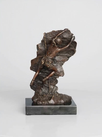 This striking bronze sculpture portrays a female rock climber captured in a moment of intense ascent, embodying both physical strength and mental determination. Created using the traditional lost-wax casting method, the sculpture showcases exceptional craftsmanship and attention to detail. The climber’s body is pressed closely against the rugged rock surface, with one arm reaching upward in pursuit of the next hold—an expressive gesture that conveys motion, tension, and purpose.