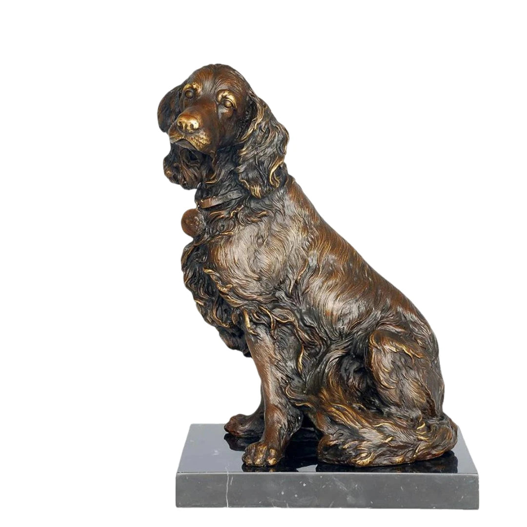 This lifelike bronze spaniel sculpture is crafted using the traditional lost-wax casting method, capturing the dog in a seated, attentive pose. The warm bronze patina highlights the wavy texture of its long coat, expressive eyes, floppy ears, and detailed collar tag. Mounted on a sleek dark marble base, the sculpture combines realism with refined presentation, making it a charming accent for home decor or a meaningful gift for dog lovers.