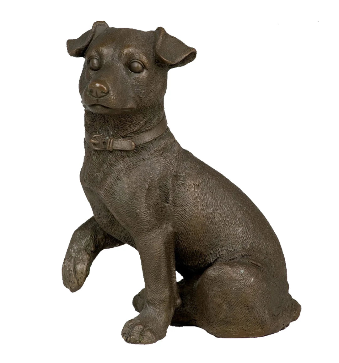 This lifelike bronze terrier sculpture is crafted using the traditional lost-wax casting method, depicting the dog in a seated pose with one paw gently raised. The warm bronze patina highlights the textured short coat, expressive eyes, and detailed collar buckle. With an integrated bronze base for stability, the sculpture combines realism and charm, making it a delightful accent for home decor or a thoughtful gift for dog lovers.